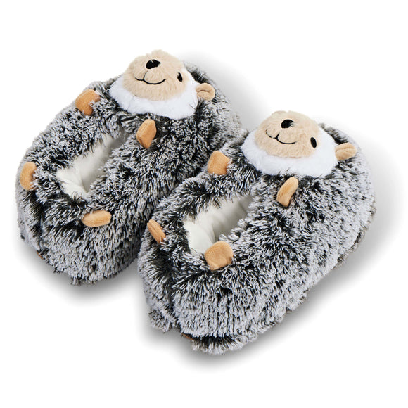 Pair of plush hedgehog slippers on a white background